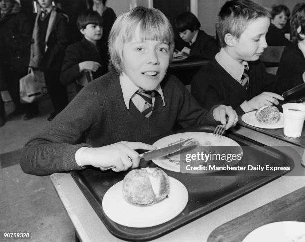 Kenneth Middleton, , tucks into his lunch.