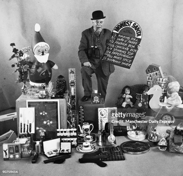 Man offers odds on various Christmas gifts including a walking doll; yard o� tweed; feather boa; chocolate box; spinning top; paperweight; mixed...