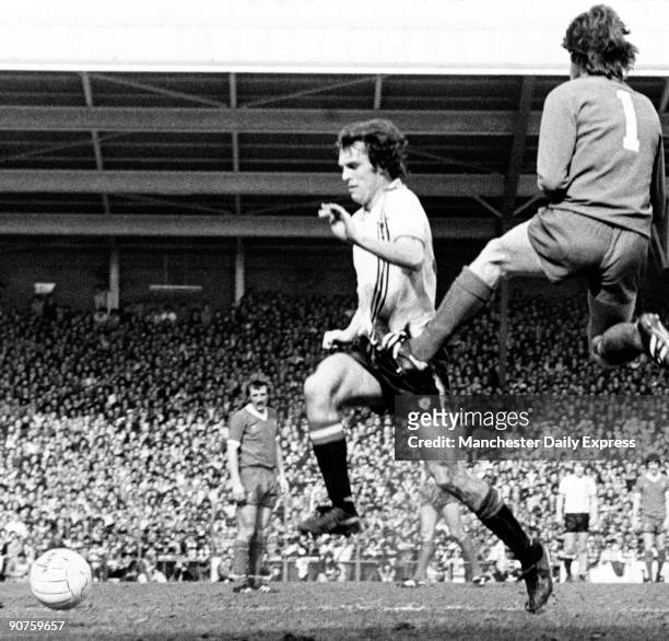 Manchester United�s Jordan is stopped with a kick in the groin by goalkeeper Ray Clemence of Liverpool. Liverpool beat Manchester United 2-0.