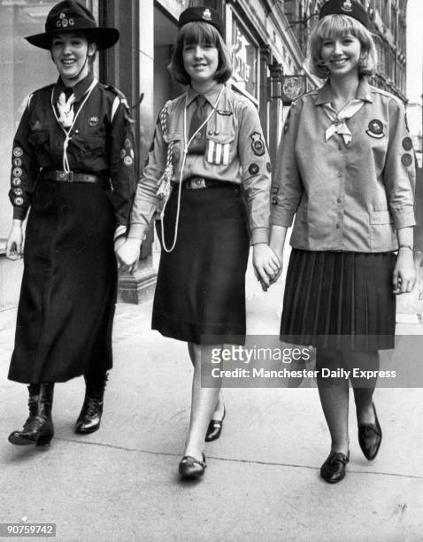 New uniform with air-hostess-style hat and v-neck collar, launched at a fashion parade at the London Girl Guides HQ. Instead of a blouse, there is...