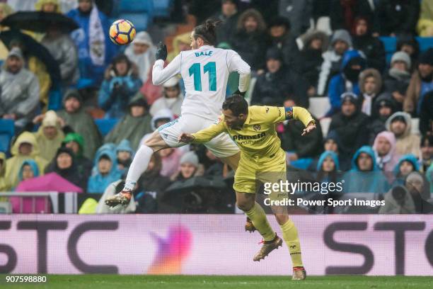 Gareth Bale of Real Madrid competes for the ball with Mario Gaspar Perez Martínez of Villarreal CF during the La Liga 2017-18 match between Real...