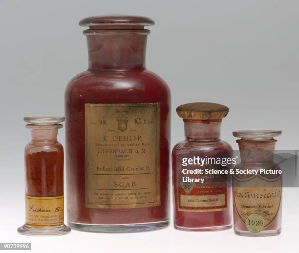 Four jars containing synthetic colorants. Sudan III manufactured by Actien Gesellschaft fur Anilin Fabrikation, Berlin, Germany ; Brilliant Acid...