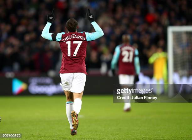 Javier Hernandez of West Ham United celebrates after scoring his sids first goal during the Premier League match between West Ham United and AFC...