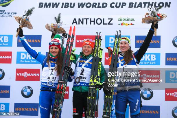 Laura Dahlmeier of Germany takes 1st place, Dorothea Wierer of Italy takes 2nd place, Darya Domracheva of Belarus takes 3rd place during the IBU...