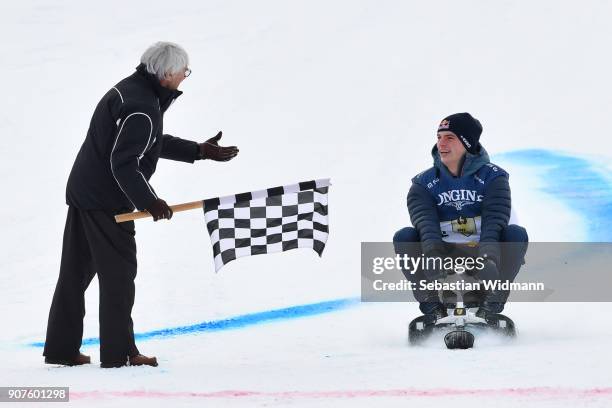 Bernie Ecclestone gestures towards Max Verstappen during the KitzCharityTrophy on January 20, 2018 in Kitzbuehel, Austria.