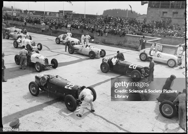 Photograph by Zoltan Glass. Drivers at the wheel: car No 22 is Battilana's Alfa Romeo Monza, No 20 is Zehender's Maserati 8C, No 6 is Caracciola's...