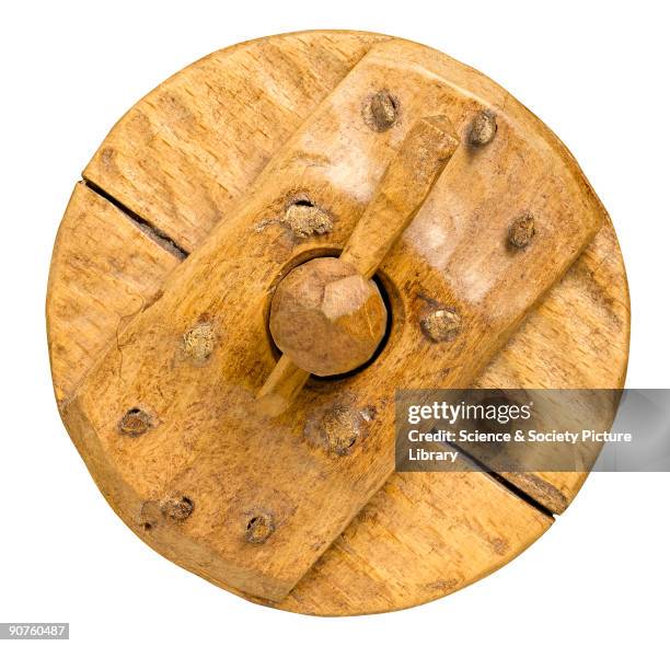 Scale model of a solid wooden chariot wheel. The two-wheeled chariot was invented by the Sumerians in Mesopotamia probably some time between 3500 and...