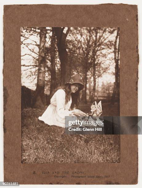 Photograph of Elsie Wright taken by Frances Griffiths using Elsie's father Arthur's Midg quarter-plate camera. This photograph is the second in the...