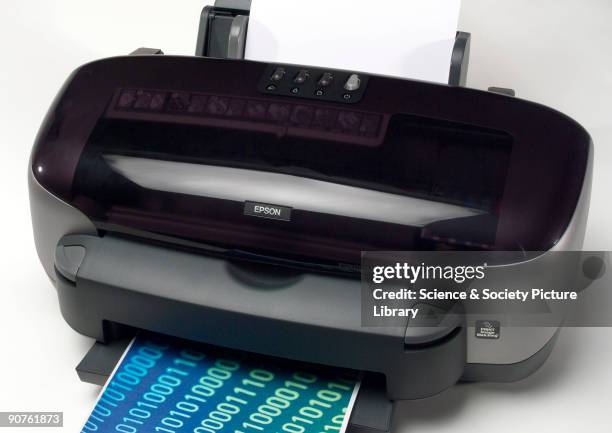 Epson Stylus Photo 950 colour inkjet printer, launched in 2002, with roll feeder, automatic paper cutter, and full bleed printing.