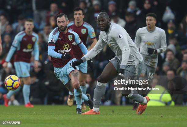 Romelu Lukaku of Manchester United in action with Steven Defour of Burnley during the Premier League match between Burnley and Manchester United at...