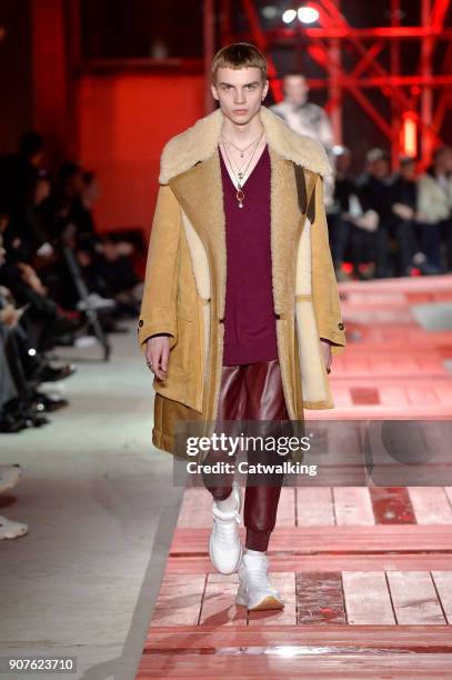 Model walks the runway at the Alexander McQueen Autumn Winter 2018 fashion show during Paris Menswear Fashion Week on January 19, 2018 in Paris,...