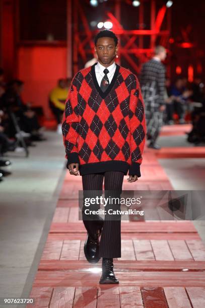 Model walks the runway at the Alexander McQueen Autumn Winter 2018 fashion show during Paris Menswear Fashion Week on January 19, 2018 in Paris,...