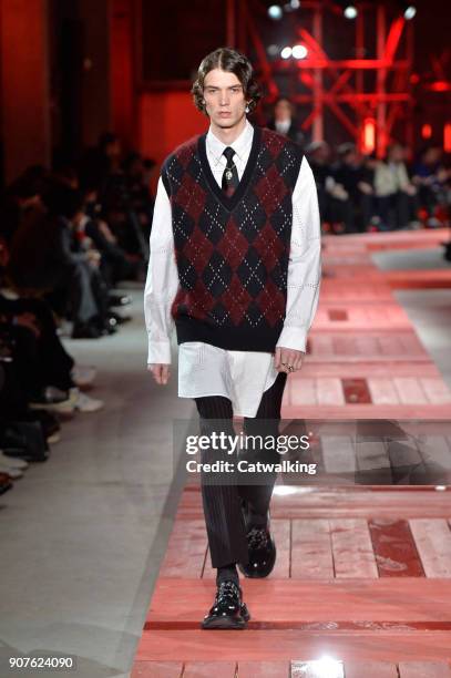 Model walks the runway at the Alexander McQueen Autumn Winter 2018 fashion show during Paris Menswear Fashion Week on January 19, 2018 in Paris,...