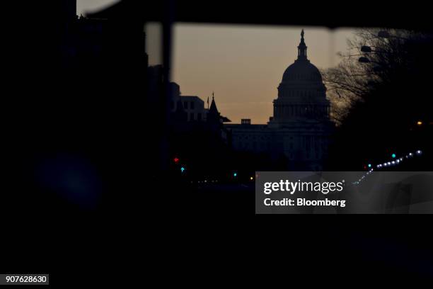 The U.S. Capitol stands in Washington, D.C., U.S., on Saturday, Jan. 20, 2018. The U.S. Government officially entered a partial shutdown early...