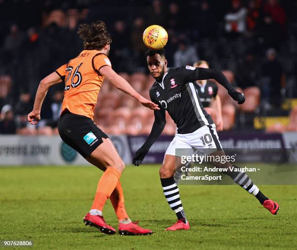 Lincoln City's Matt Green vies for possession with Barnet's Dan Sweeney during the Sky Bet League Two match between Barnet and Lincoln City at The...