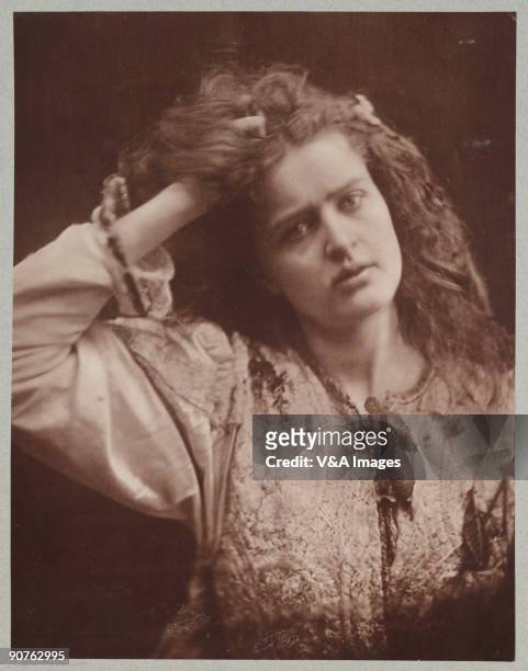 Carbon print. Photograph by Julia Margaret Cameron of a woman as Ophelia from William Shakespeare's Hamlet. Cameron's photographic portraits are...
