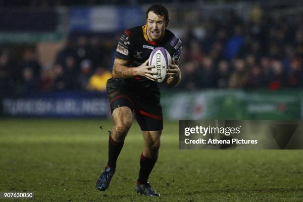 Adam Warren of Dragons carries the ball forwards during the European Challenge Cup match between Dragons and Bordeaux Begles at Rodney Parade on...