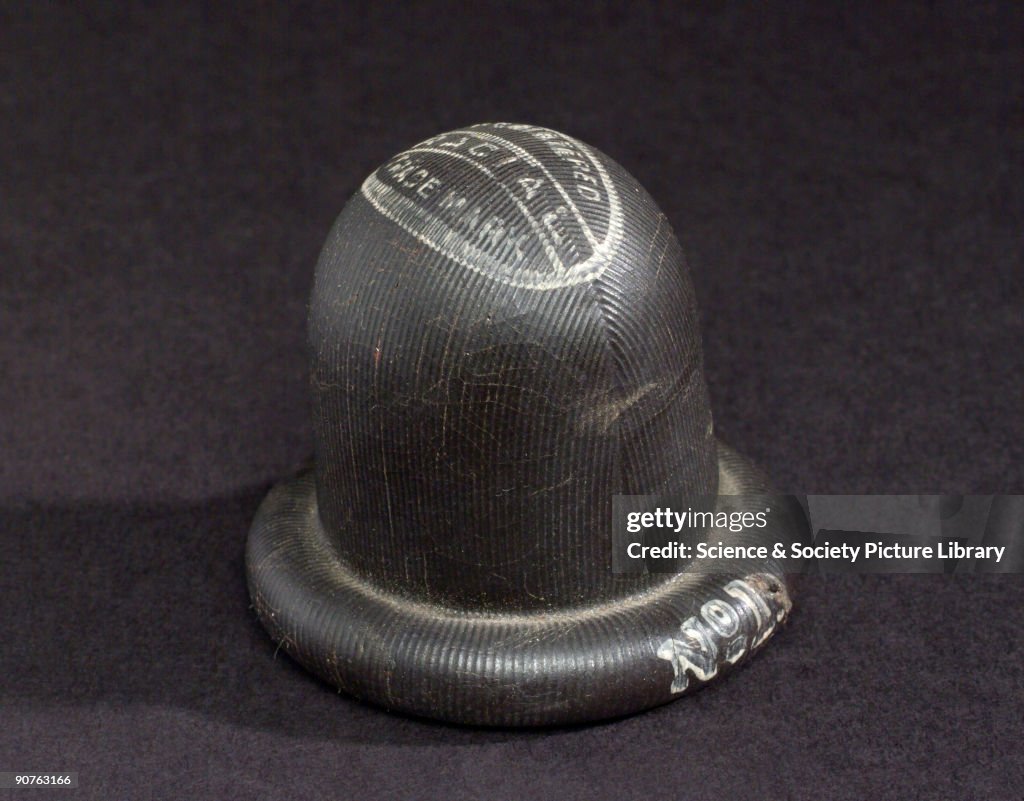 Rubber vault cap, c 1920s.