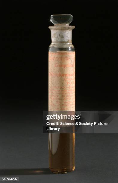 Glass bottle of chloroform and morphine mixture by Burroughs Wellcome, London.