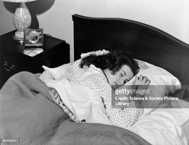 Photograph of a sleeping woman, taken by Photographic Advertising Limited in 1952. The photograph was used in 1954 in a medical exhibition to...