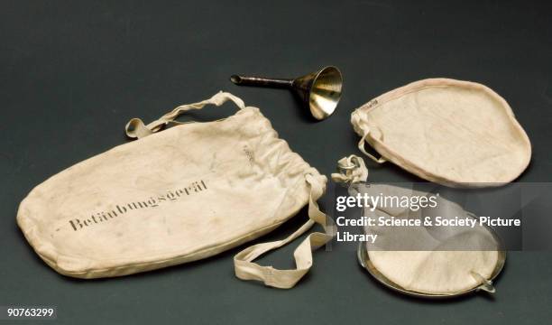 Cotton drawstring bag containing face mask and funnel for inhaling ether as an anaesthetic, used by German Army during World War I. The first...