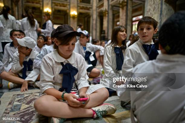 School children visiting the Montevideo Legislative Palace or Parliament as part of their education.