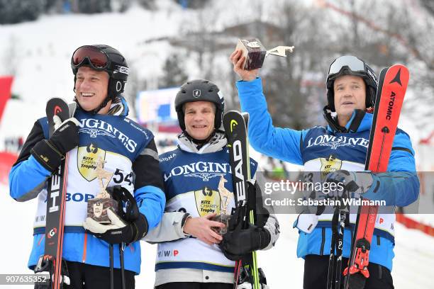 Philippe Roodhooft , Markku Korvenranta and Armin Assinger pose for a picture during the victory ceremony of the KitzCharityTrophy on January 20,...