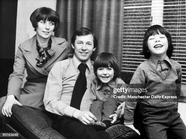 Alex Ferguson, British football manager, with wife Cathy and twins Jason and Darren. Scottish footballer Ferguson played for St Johnstone,...