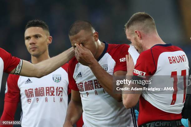 Distraught Salomon Rondon of West Bromwich Albion is comforted by team mates after his shot at goal was blocked by James McCarthy of Everton and...