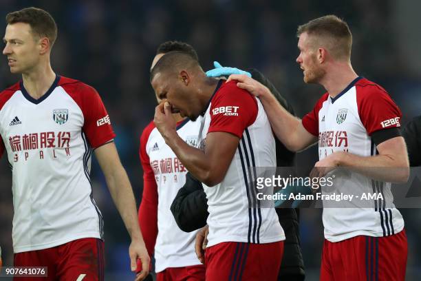 Distraught Salomon Rondon of West Bromwich Albion is comforted by team mates after his shot at goal was blocked by James McCarthy of Everton and...