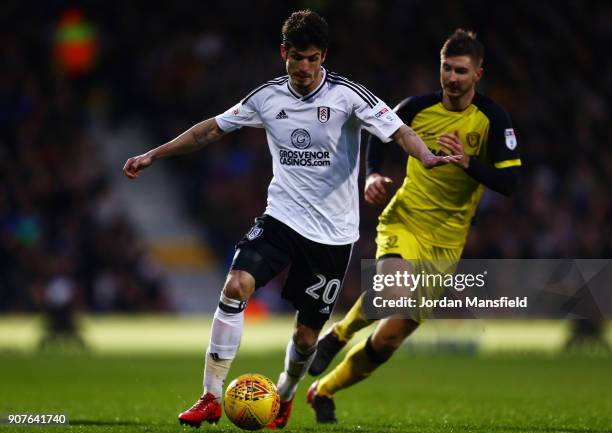 Lucas Piazon of Fulham avoids a tackle from Luke Murphy of Burton during the Sky Bet Championship match between Fulham and Burton Albion at Craven...