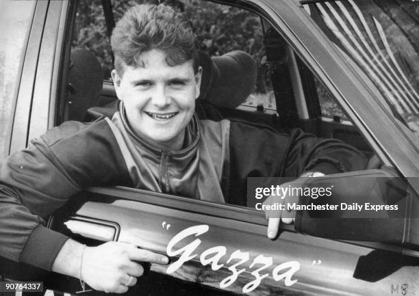 Smiling Paul Gascoigne takes delivery of his brand new personalised Rover car. Talks of a new contract, but Gazza steers clear of questions about his...