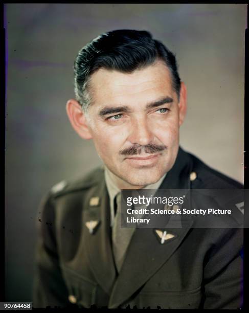 Kodachrome photograph of Clark Gable taken on a visit to the Kodak factory at Harrow, Middlesex, by JCA Redhead during World War Two. This portrait...