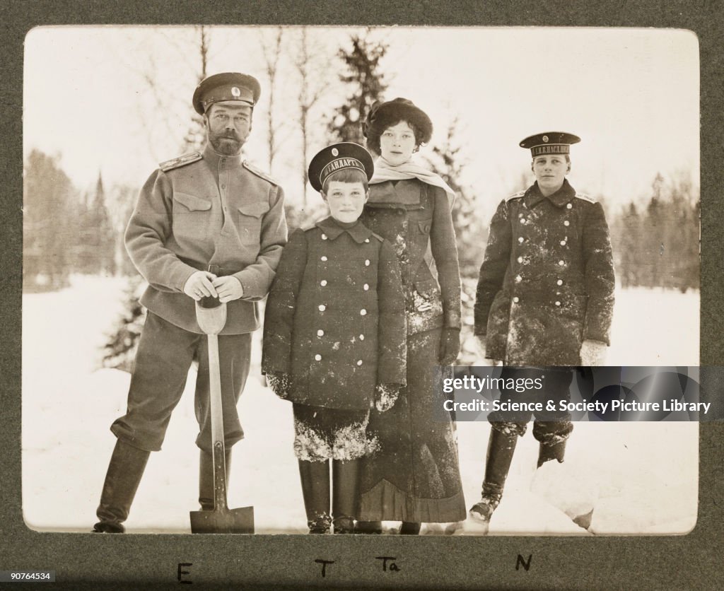 Tsar Nicholas II and and his family in the snow, Russia, 1915.