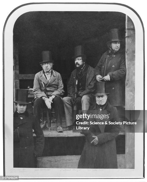 Isambard Kingdom Brunel, standing to the far right, with his colleagues at the launch of his ship the SS Great Eastern in 1857. The seated man on the...