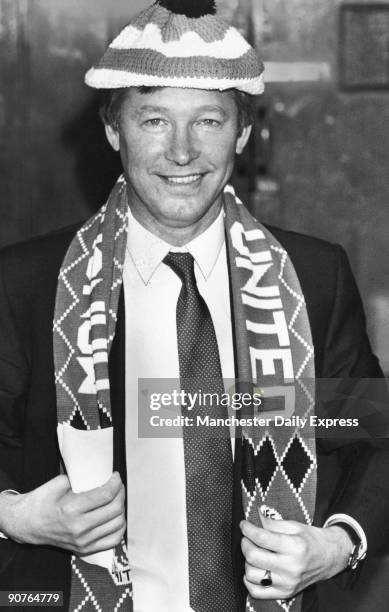 Ferguson, the new manager, wearing Manchester United colours at an Old Trafford press conference. Scottish footballer Ferguson played for St...