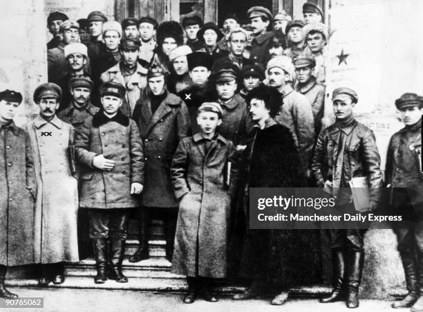 Prominent figures in the history of the USSR: Joseph Stalin , marked with two crosses, second left in the front row; Leon Trotsky in fur coat, front...
