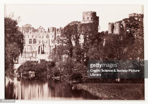 Photographic view of Warwick Castle, published by Francis Bedford & Co. Standing at the edge of the River Avon, parts of the castle date back to the...