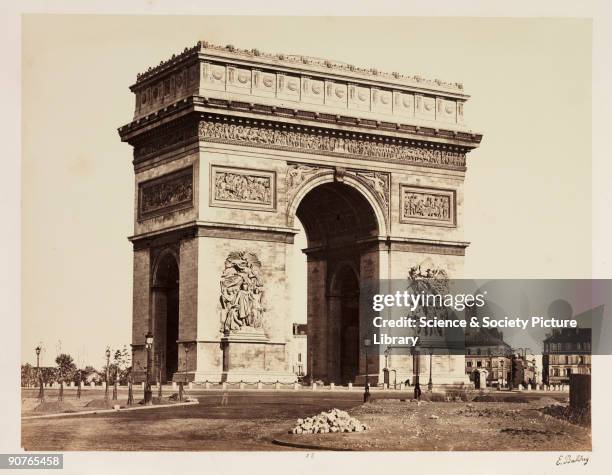 Photograph of the Arc de Triomphe, Paris, taken by Edouard-Denis Baldus in about 1865. The Arch was commissioned by Napoleon in 1806, but not...