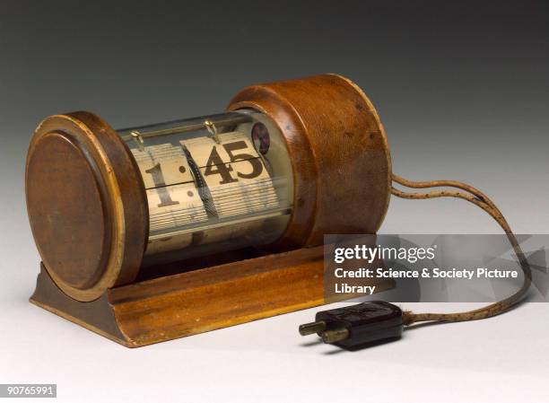 Clock with digital display made by The Westinghouse Electric Supply Co, USA. Clocks such as this used synchronous electric motors and depended on the...