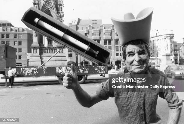 British protester wearing a Reagan mask in front of a Cruise missile. Reagan , president of the United States , was responsible for the greatest...