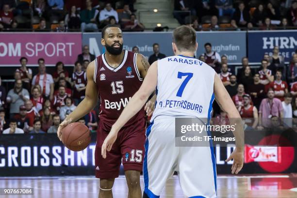 Reggie Redding of Muenchen and Sergey Karasev of St. Petersburg battle for the ball during the EuroCup Top 16 Round 3 match between FC Bayern Munich...