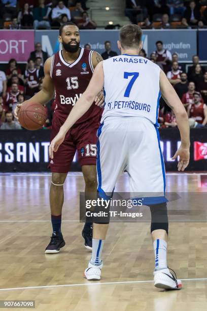 Reggie Redding of Muenchen and Sergey Karasev of St. Petersburg battle for the ball during the EuroCup Top 16 Round 3 match between FC Bayern Munich...