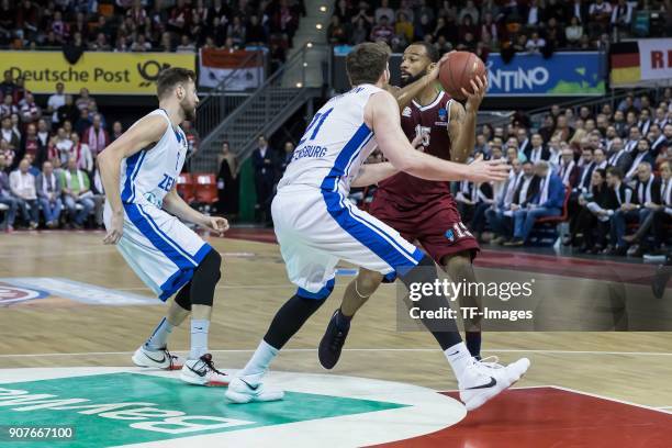 Shayne Whittington of St. Petersburg and Reggie Redding of Muenchen battle for the ball during the EuroCup Top 16 Round 3 match between FC Bayern...