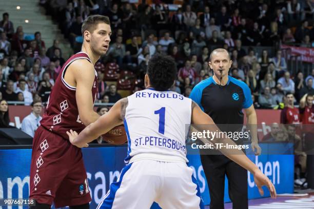 Stefan Jovic of Muenchen and Scottie Reynolds of St. Petersburg battle for the ball during the EuroCup Top 16 Round 3 match between FC Bayern Munich...