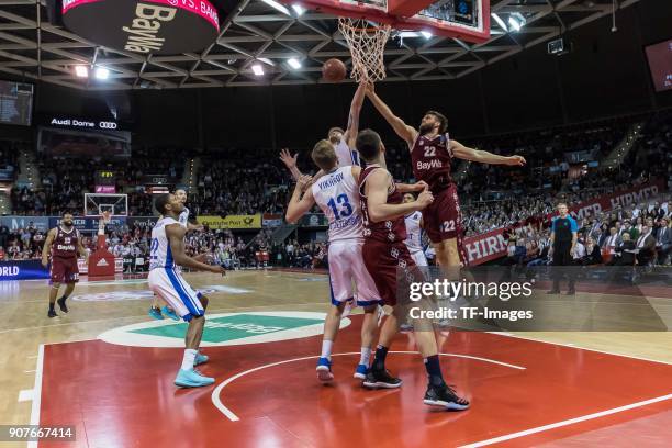 Shayne Whittington of St. Petersburg and Danilo Barthel of Muenchen battle for the ball during the EuroCup Top 16 Round 3 match between FC Bayern...