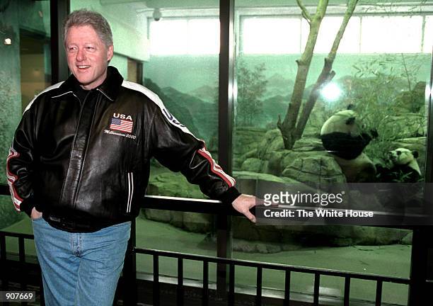 President Clinton speaks with the press January 6, 2001 at the feeding area of the new Panda exhibit at the National Zoo in Washington. Four days...