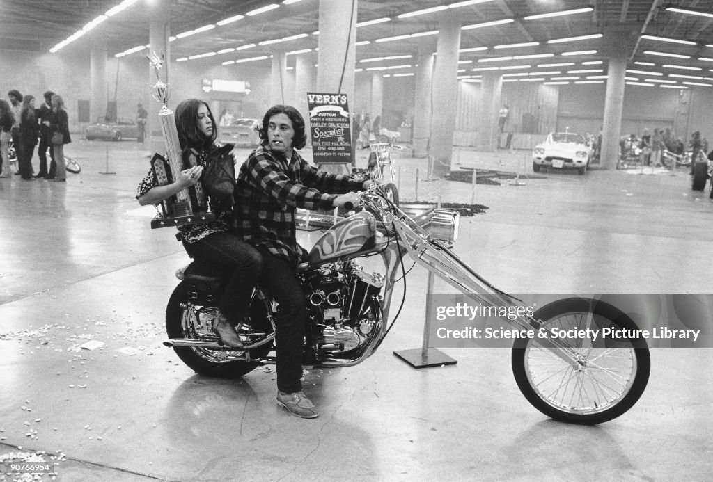 Couple on a Harley Davidson chopper, USA, late 1960s.