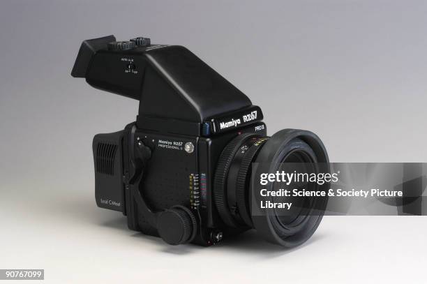 Mamiya RZ67 medium format camera with Leaf C-most digital camera back. In digital photography, the image is converted into digital information which...
