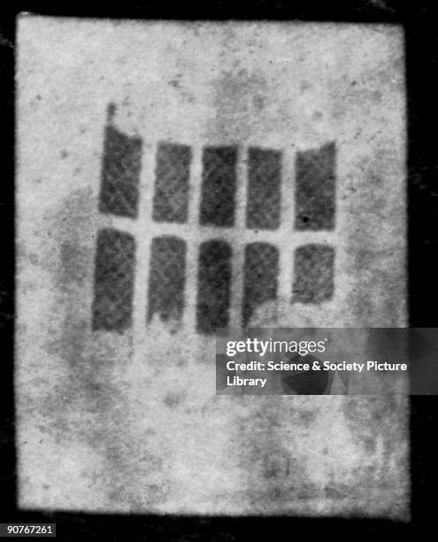 Close up of photogenic drawing negative by William Henry Fox Talbot showing a latticed window taken from inside the south gallery of Lacock Abbey,...